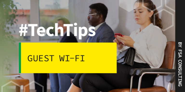 Man and women in a waiting room in their phones.
